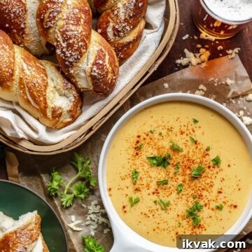 A basket of soft pretzels with beer cheese dip.