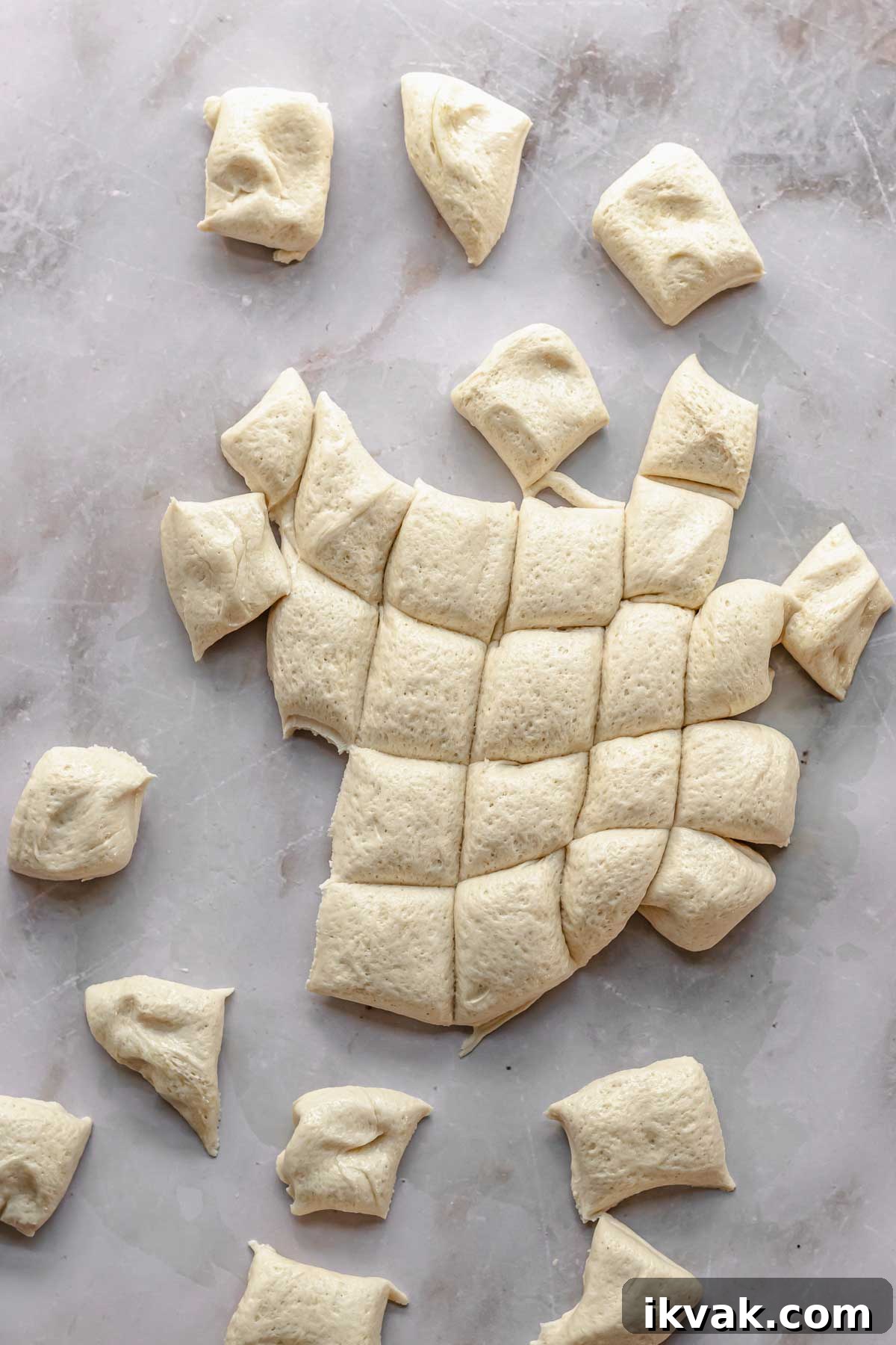 Pizza dough cut into one-inch squares.