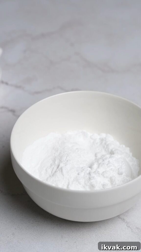 A bowl of powdered sugar and instant clearjel for stabilized whipped cream.