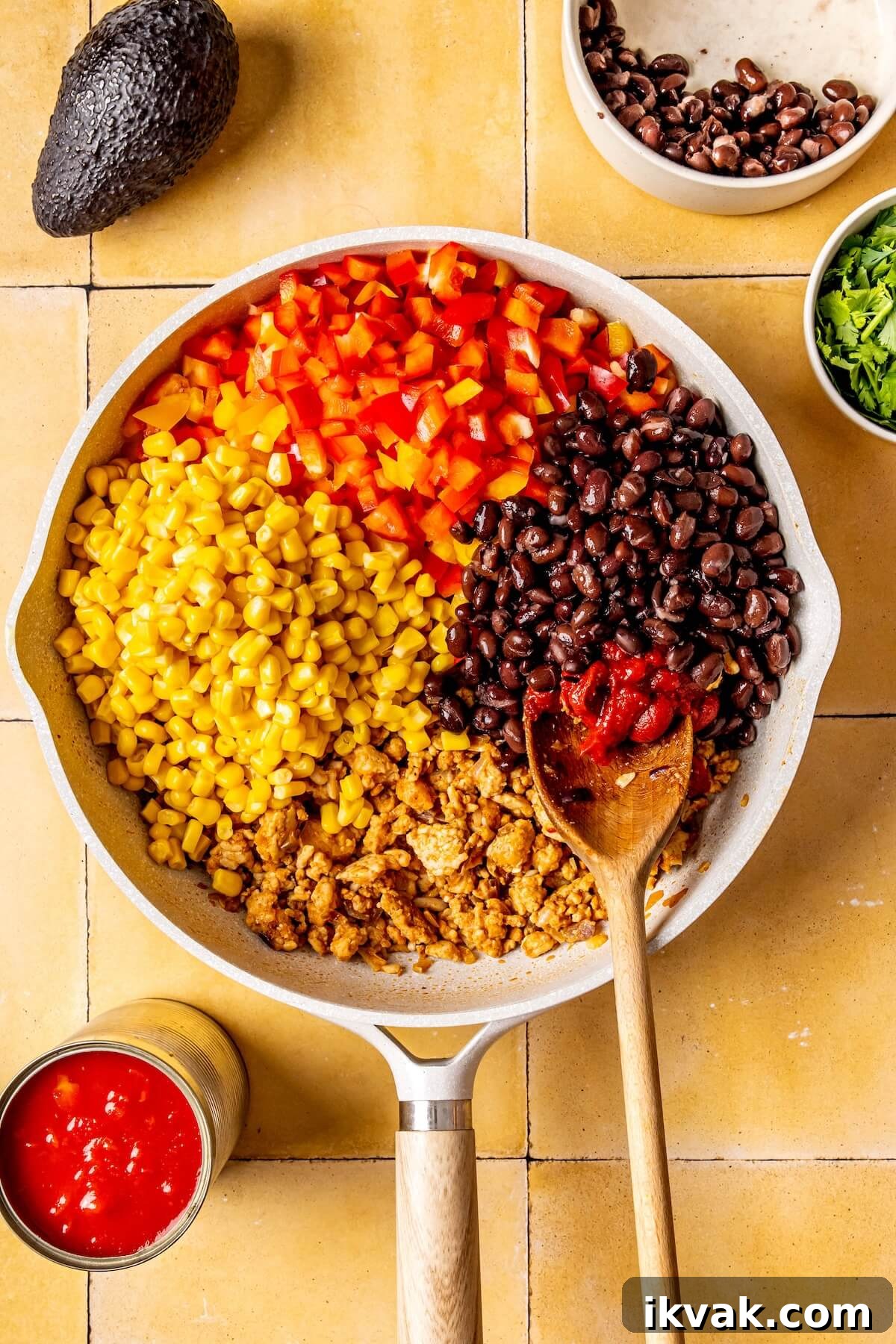 Southwest-Style Stuffed Peppers with Savory Beef and Corn 11 How to Make Southwest Stuffed Peppers with Black Beans and Corn Step 5 - Olivia Adriance