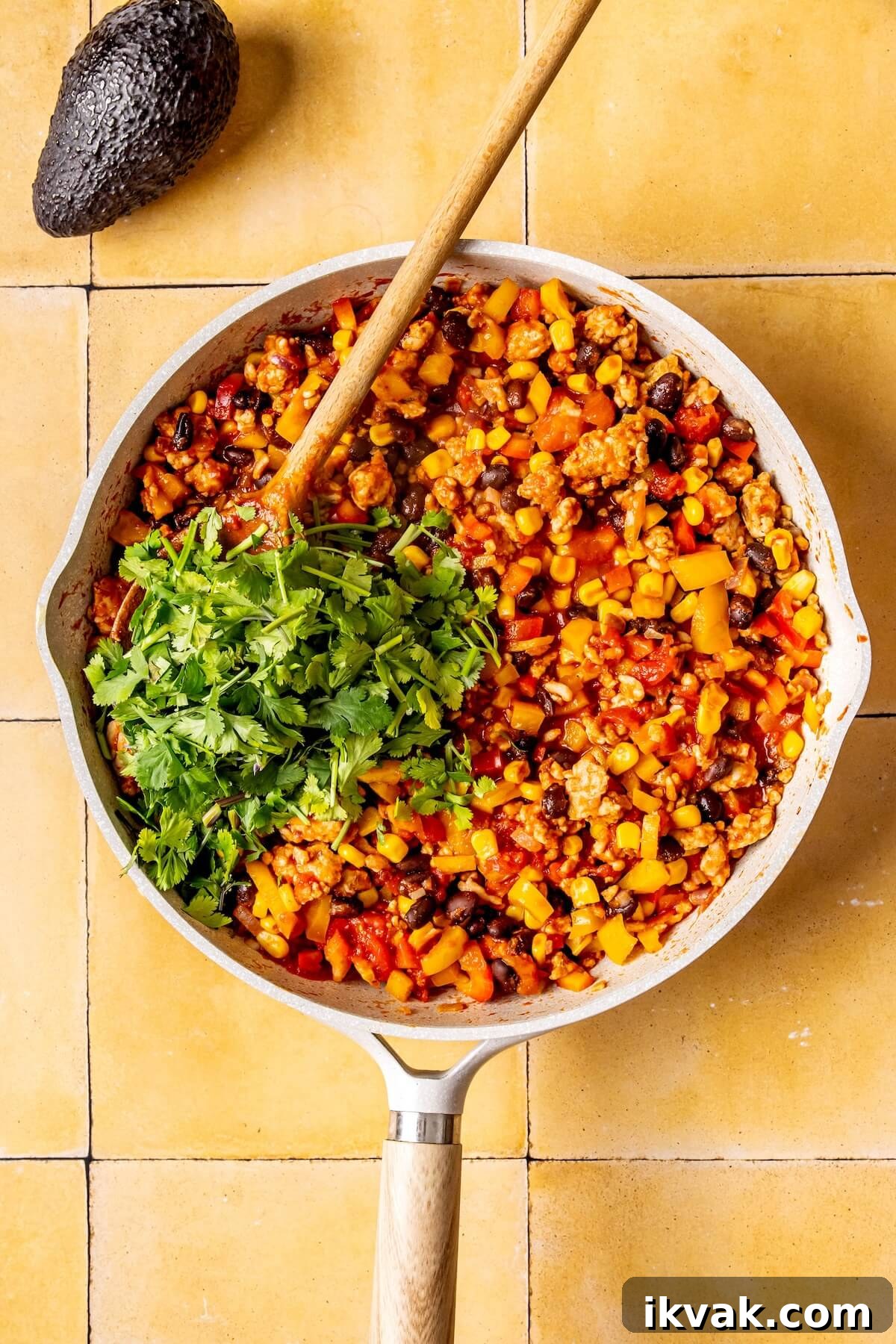 Southwest-Style Stuffed Peppers with Savory Beef and Corn 12 How to Make Southwest Stuffed Peppers with Black Beans and Corn Step 6 - Olivia Adriance