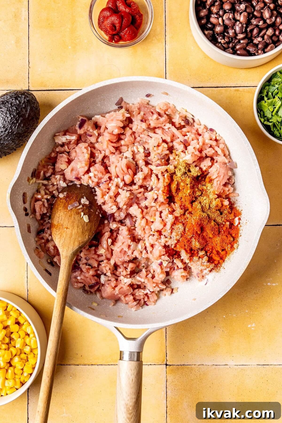 Southwest-Style Stuffed Peppers with Savory Beef and Corn 10 How to Make Southwest Stuffed Peppers with Black Beans and Corn Step 4 - Olivia Adriance