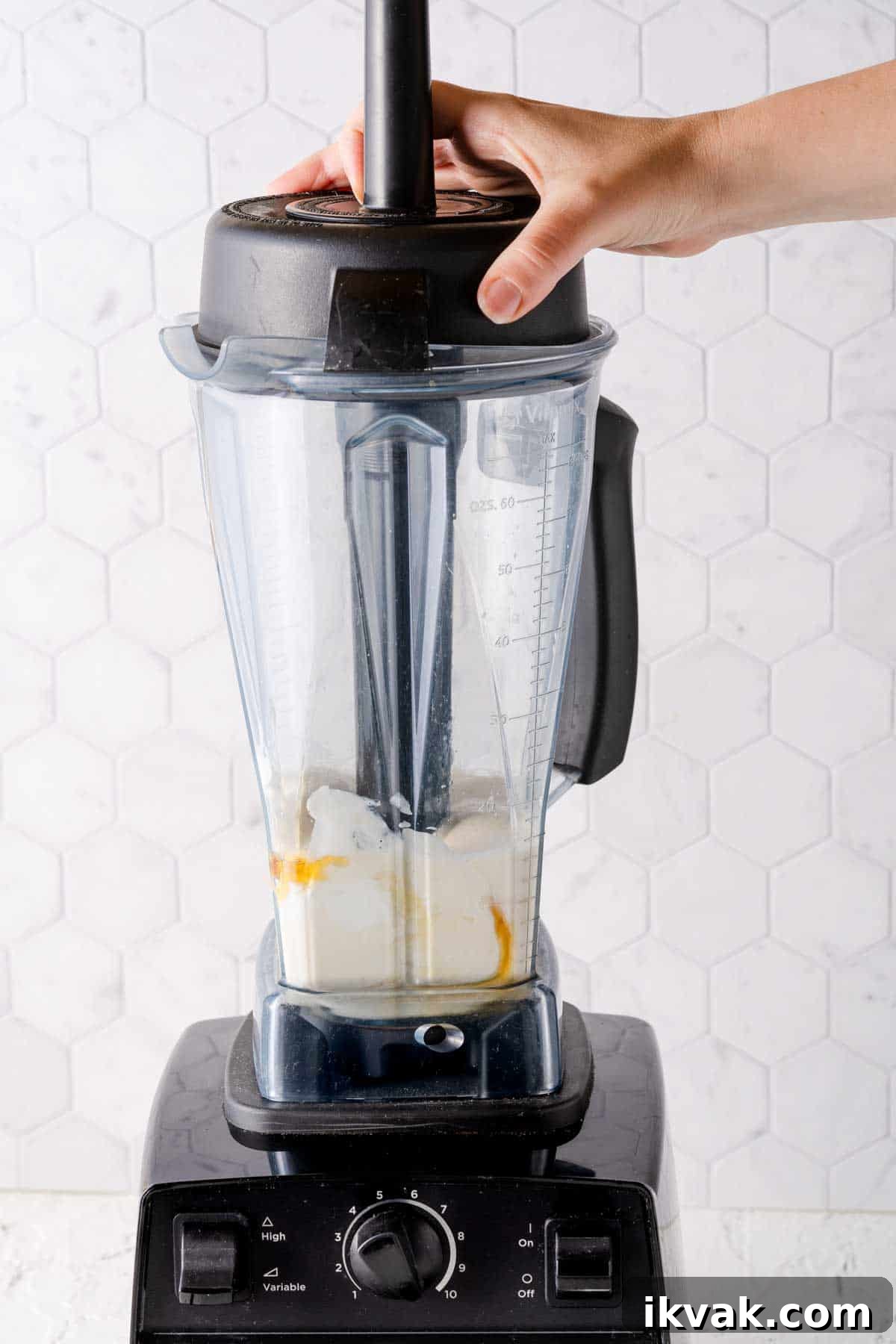 Creamy Banana and Watermelon Smoothie Recipe 5 banana, milk, yogurt and honey being blended in blender