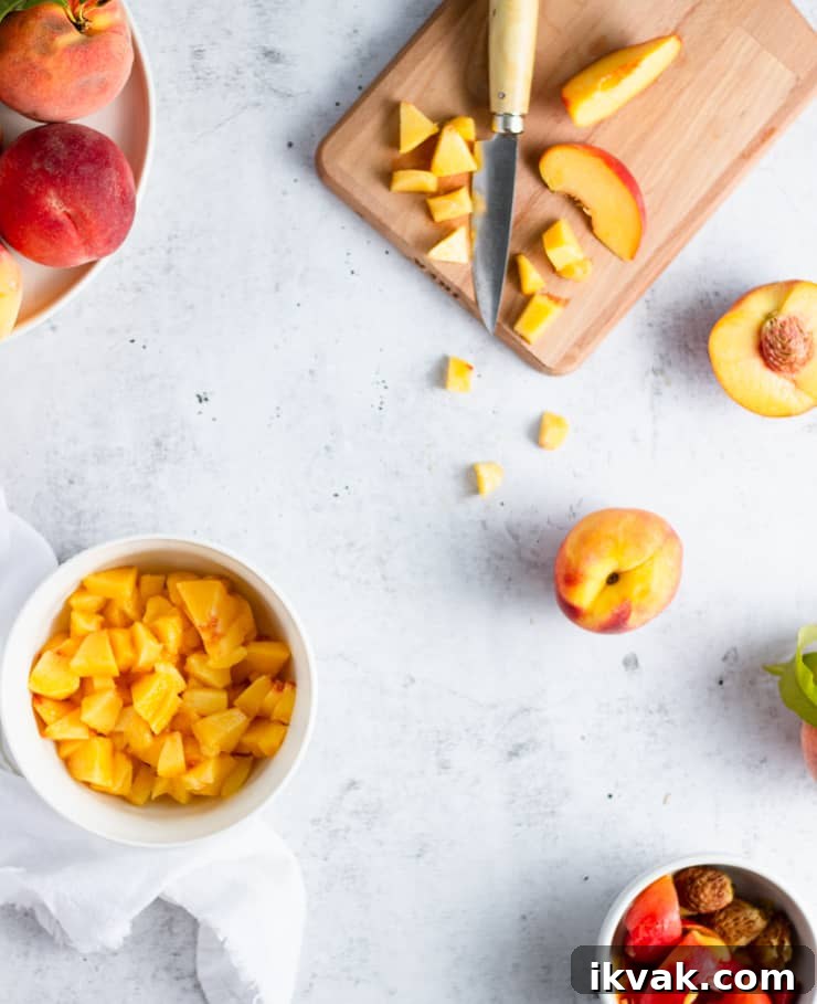 Small-Batch Bourbon Peach Jam Recipe for Preserving Summer Flavor 3 diced peaches on a cutting board