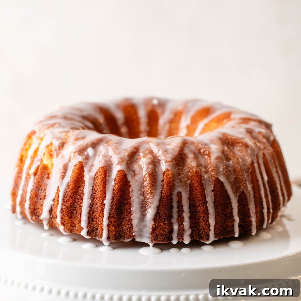 Moist 7-Up Pound Cake | Southern Soul Food Recipe 16 glazed 7-up pound cake on white cake stand