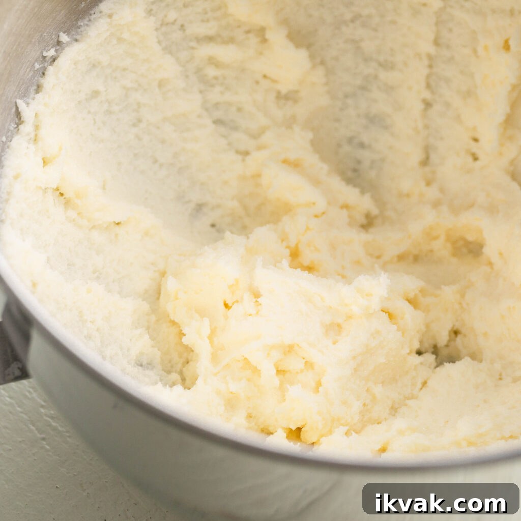 Moist 7-Up Pound Cake | Southern Soul Food Recipe 8 mixing sugar into creamy butter