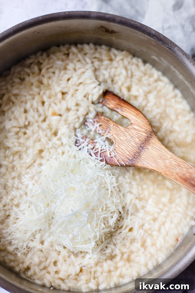 Parmesan in a pan with risotto and onions.