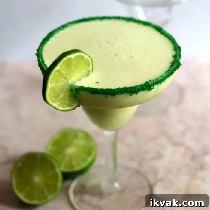 Key lime pie margarita on a table.