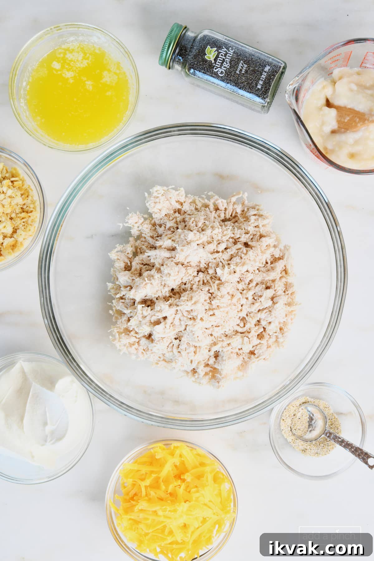 Ingredients to make Poppy Seed Chicken in glass bowls.