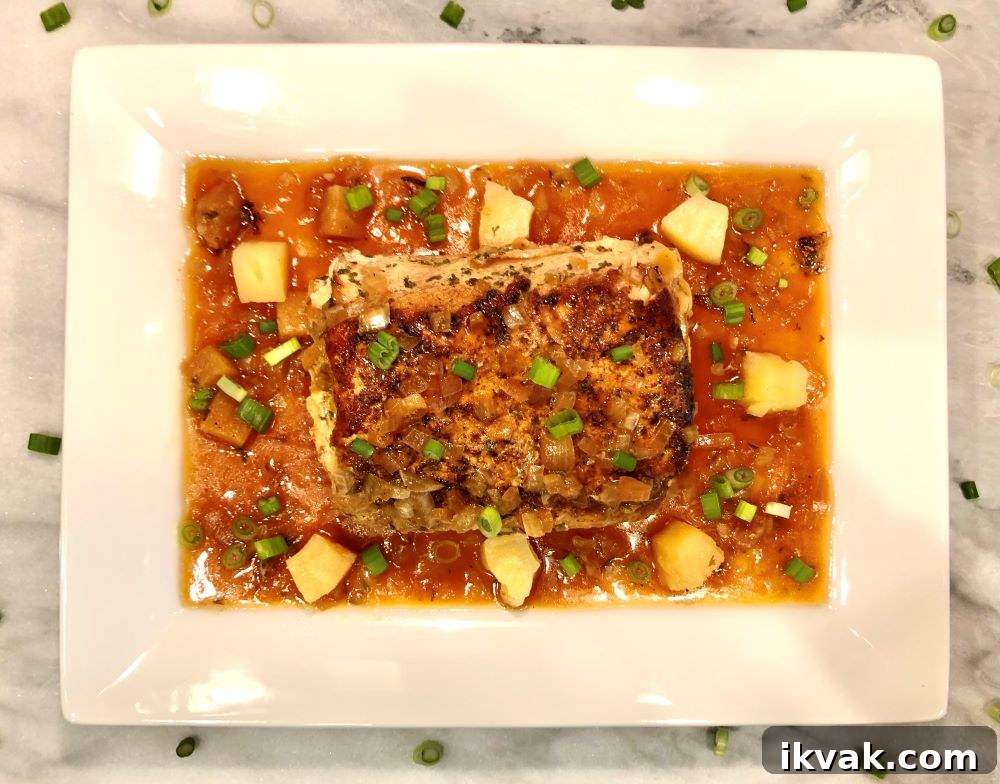 Slow Cooker Hawaiian Pork seared and served with gravy