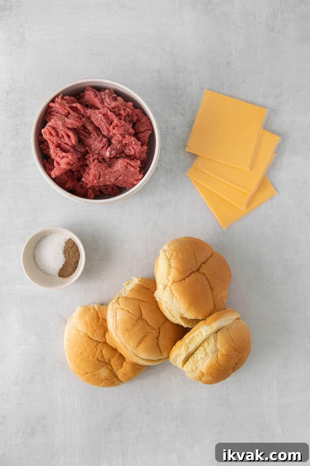 Ingredients for juicy lucy burgers on a counter.
