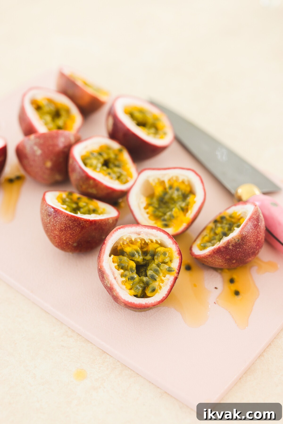 Silky Vegan Passion Fruit Posset Recipe 4 passion fruits cut open on a cutting board