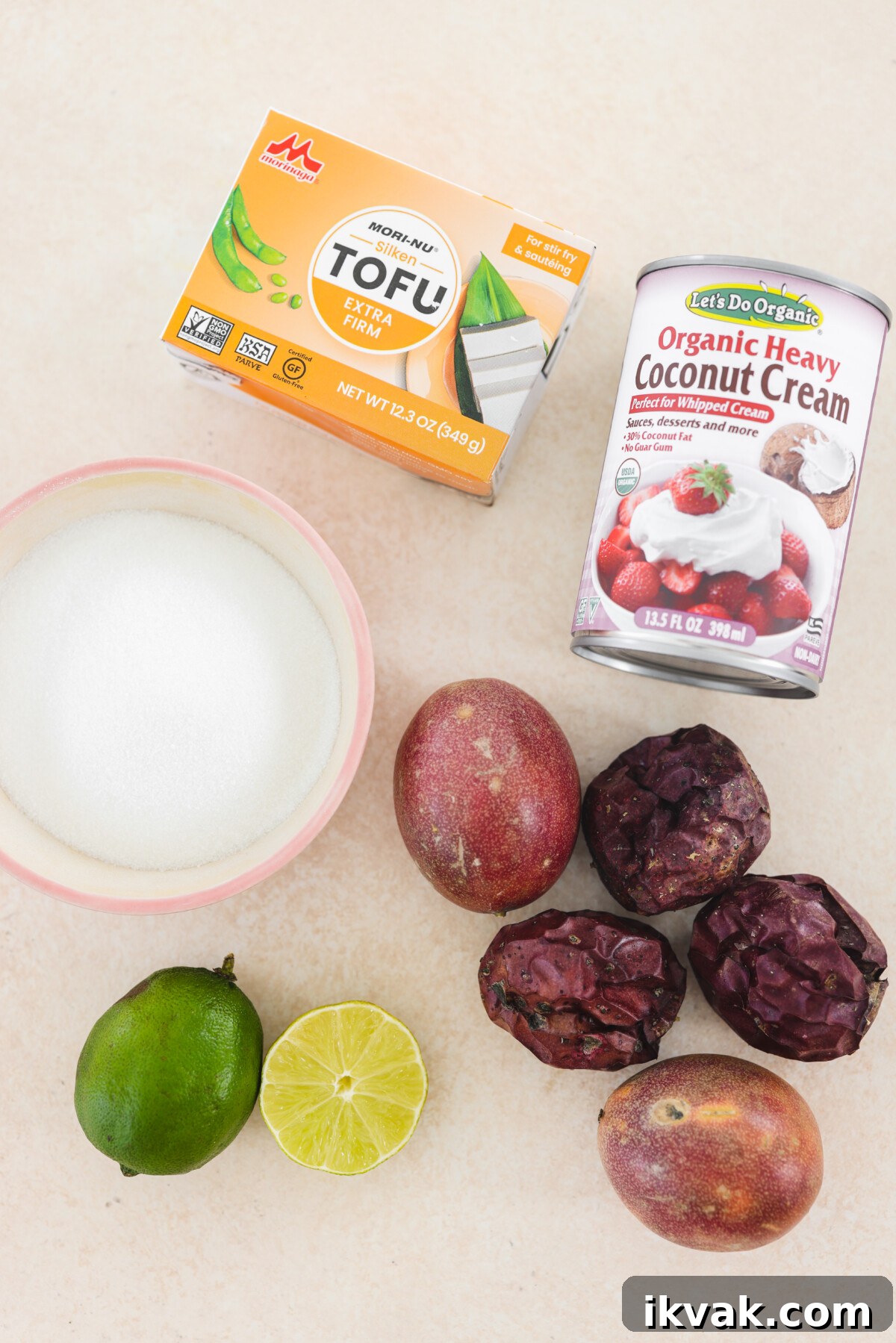 Silky Vegan Passion Fruit Posset Recipe 5 recipe ingredients on a white surface