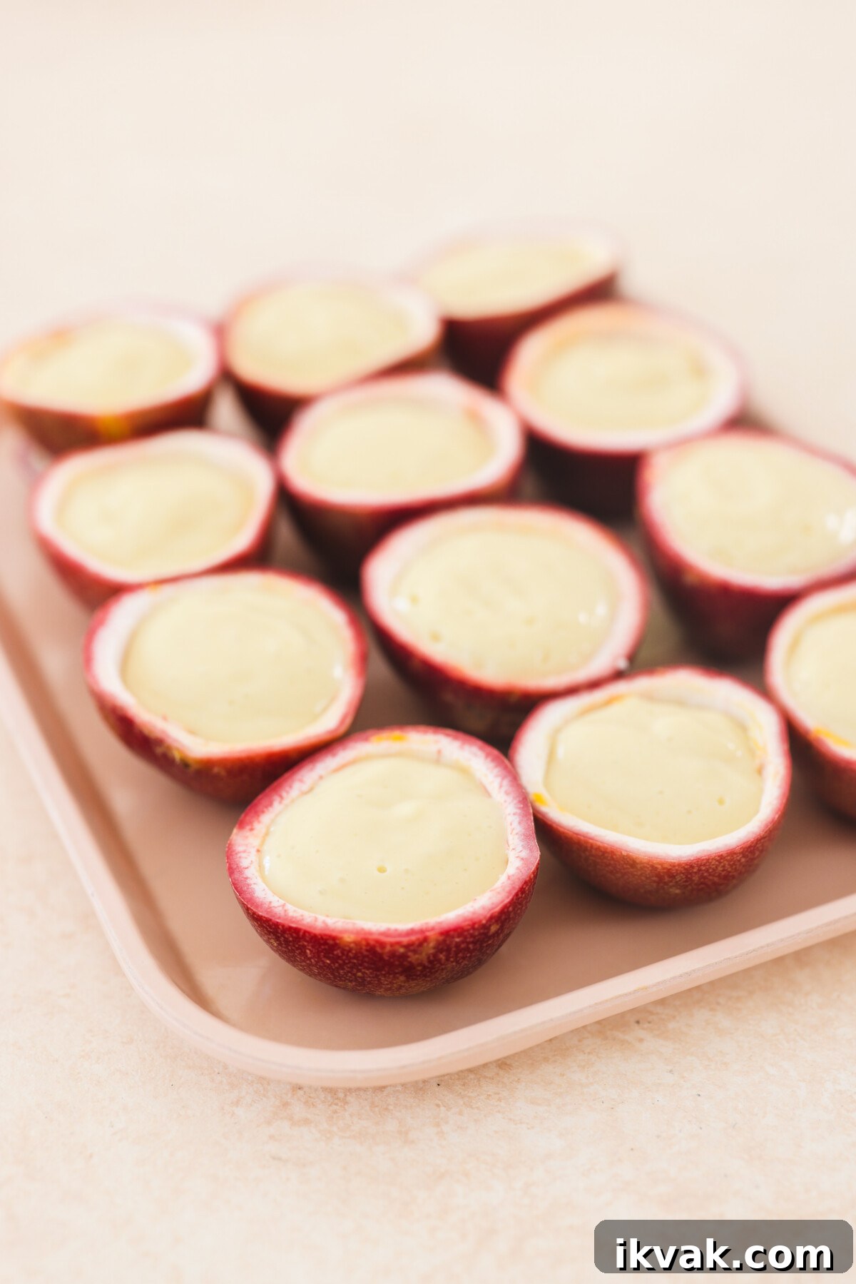 Silky Vegan Passion Fruit Posset Recipe 9 passion fruit shells filled with creamy dessert