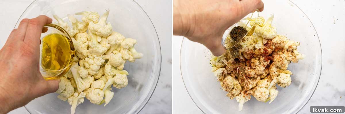 Duo of 2 overhead images showing someone's hand pouring olive oil and a mix of herbs and spices into cauliflower florets in a glass bowl on marble background.