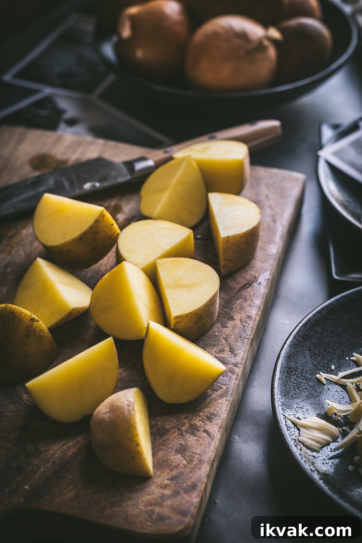Plokkfiskur: Classic Icelandic Potato and Fish Stew 7 quartered gold potatoes slice and ready to go in a pot for icelandic fish stew with potatoes
