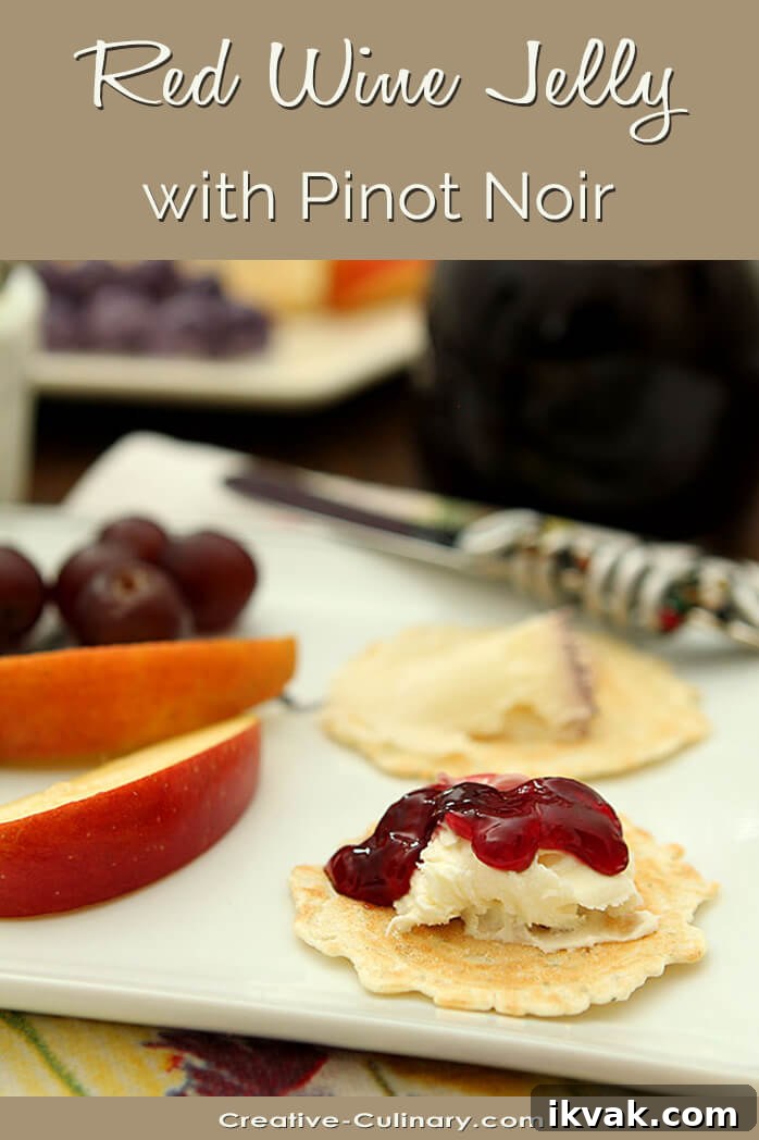 Red Wine Jelly Recipe: Sweet, Bold Preserve 5 Red Wine Jelly Served on a Cracker on Top of Mascarpone Cheese