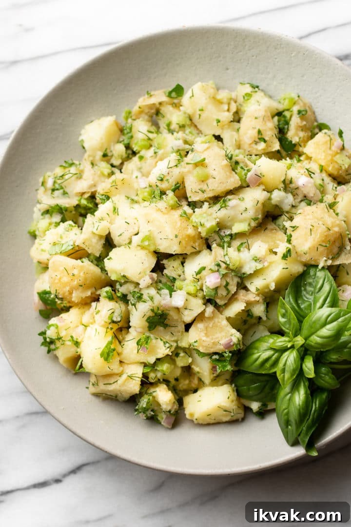 No-Mayo Potato Salad with Tangy Herb Dressing 4 mayo-free potato salad in a serving bowl
