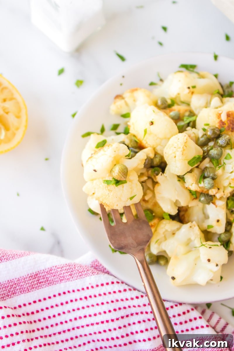Serving of Cauliflower with Capers cauliflower with capers in a dish with a fork