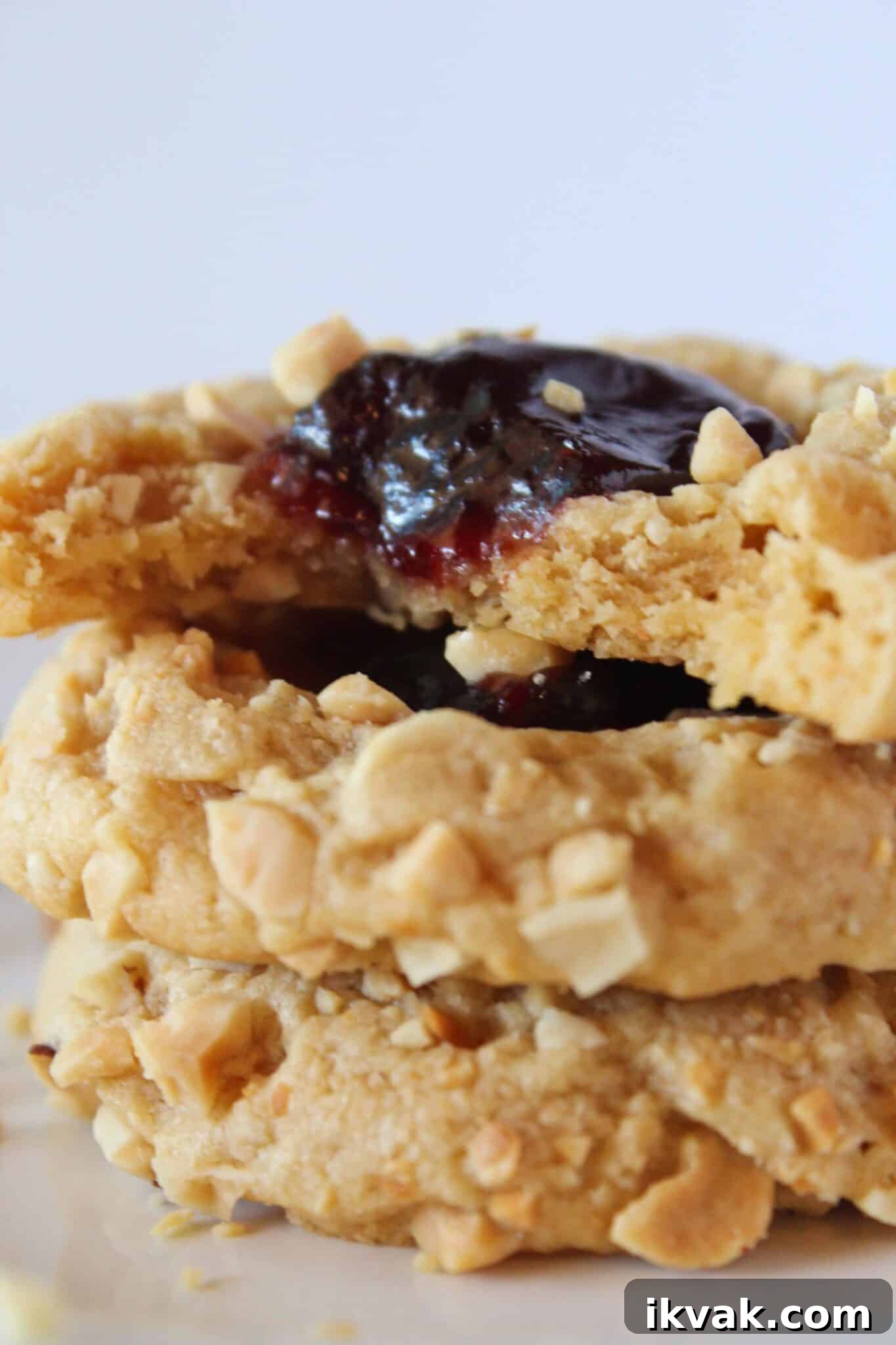 Peanut Butter and Jelly Cake-Mix Cookies 7 PB & J Cookies stacked on each other.