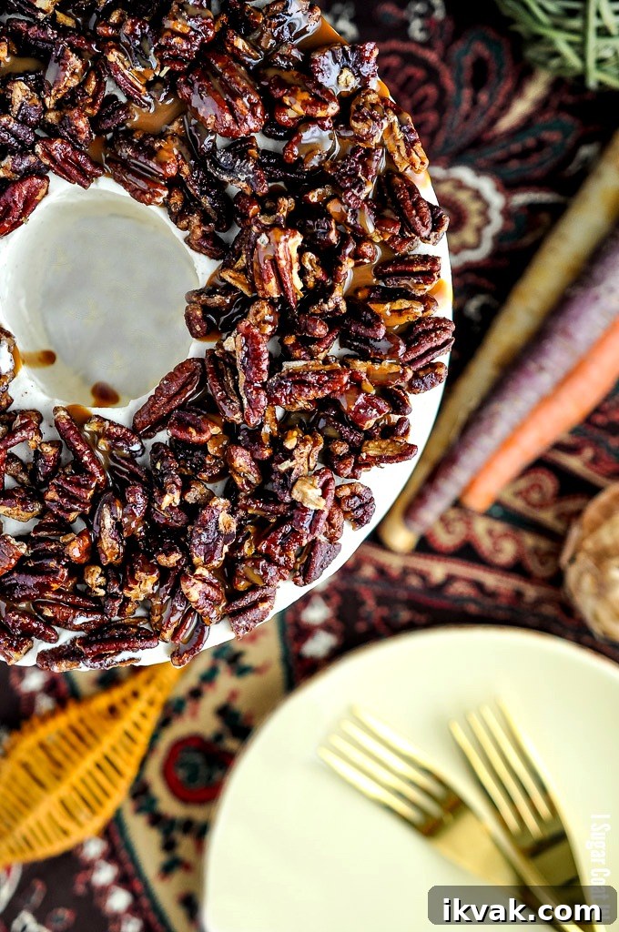 Whipped Mascarpone Browned Butter Carrot Cake with carrot caramel pecans makes a perfectly decadent centrepiece for your Thanksgiving celebration!